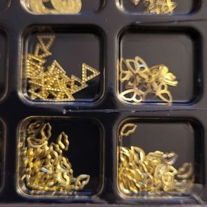 Gold and silvertone nail art kits and designs